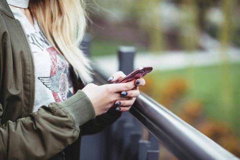 woman view her phone